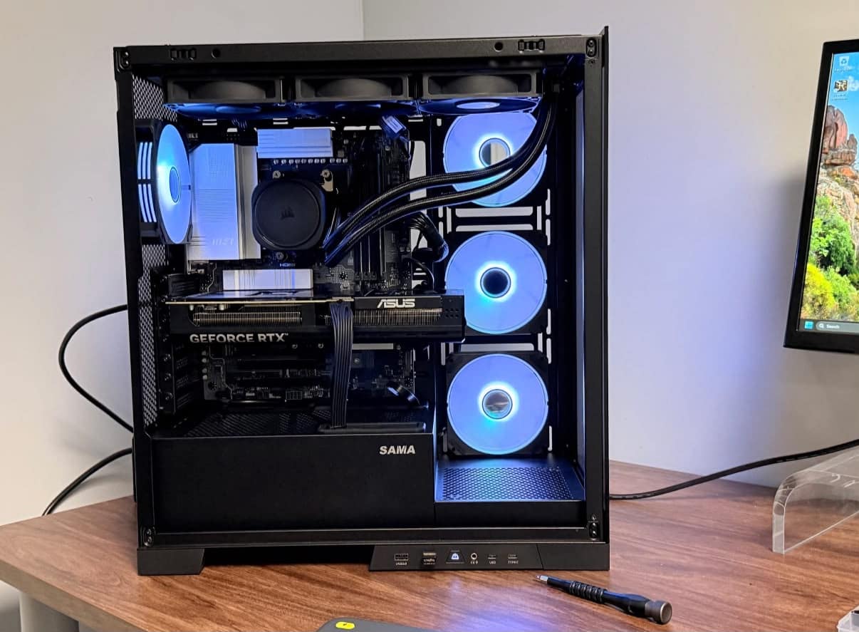 A custom gaming PC built by GeekzUP, with cable management and RGB lighting